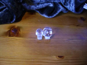 Two skulls beads of carved crystal. New Age Shop, Oxford 2000. Collected by B Basura