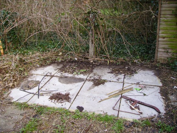 Gray Road, April 2015, found artefacts on the slabs on the foundations of the ruined shed. Various pieces of ironwork, including 200 rusted three inch nails and model railway track.